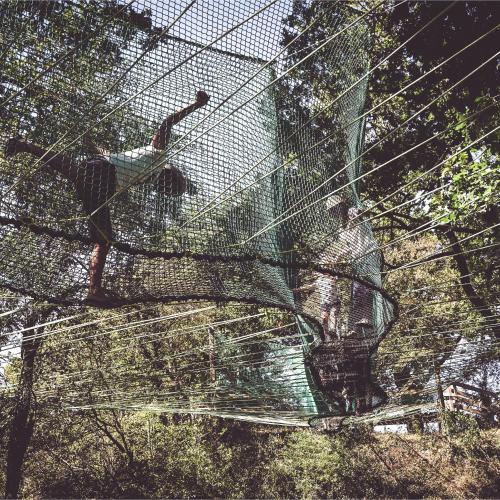 a person is standing in a batting cage at Le Val Suzenay in Vendeuvre-sur-Barse
