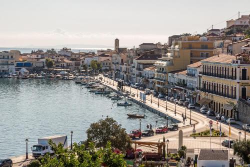 a view of a city with boats in the water at LAS HOTEL & SPA in Gythio