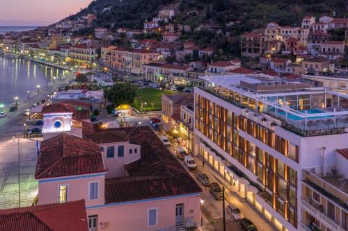 an aerial view of a city at night at LAS HOTEL & SPA in Gythio