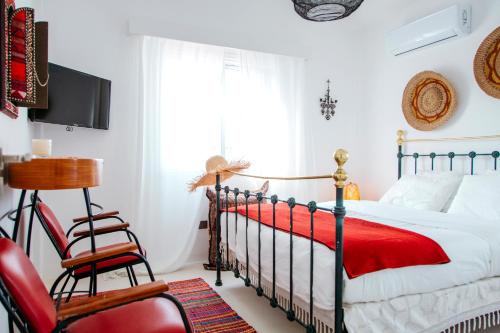 Ένα ή περισσότερα κρεβάτια σε δωμάτιο στο Island Home Seaside Villa