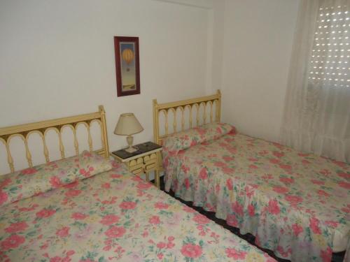 A bed or beds in a room at Les Doyes Bl 5 3-73 LEK