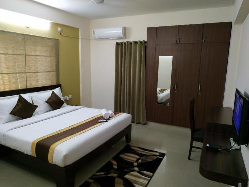 Postel nebo postele na pokoji v ubytování Bulande Comforts-Service Apartment In Brookfield