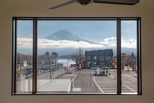 a view of a mountain from a window at Setsuu in Fujikawaguchiko