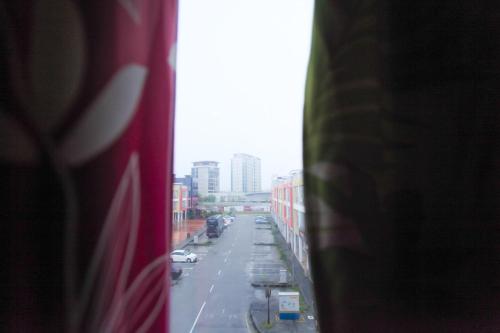 a view of a city street from a window at HOTEL PREMIUM in Ipoh