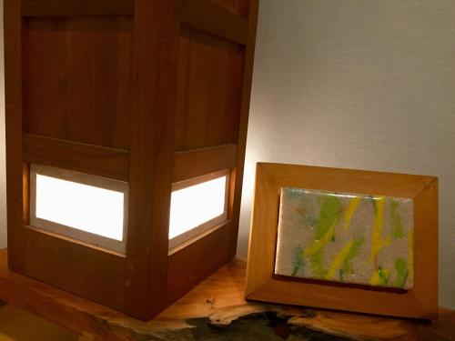 two windows in a room with a fishtank next to it at BluePlanet in Gyeongju