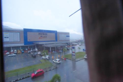 a view from a window of a parking lot at HOTEL PREMIUM in Ipoh