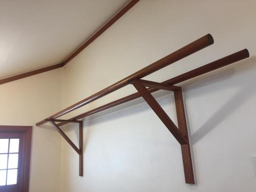 a wooden shelf on the wall of a room at BluePlanet in Gyeongju
