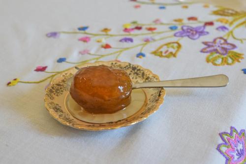 a dessert on a plate on a table at The Veranda of Gavrion-Exclusive, Centrally located with Seaview in Gavrion