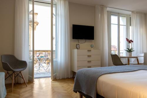 Katil atau katil-katil dalam bilik di Aqualago casa vacanze - apartament B