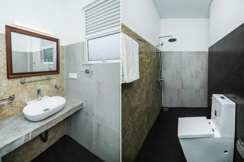 Een badkamer bij Grand Rockland Hotel