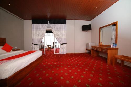 OYO 278 Hotel Rivelkaにあるベッド