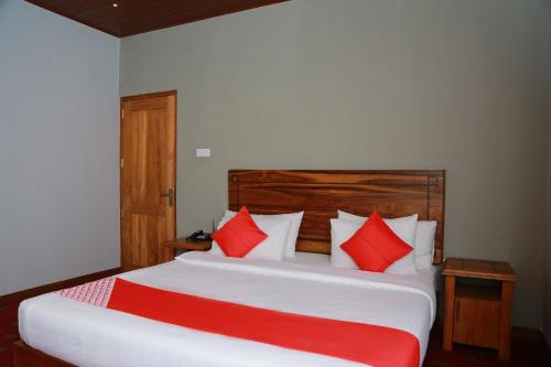 OYO 278 Hotel Rivelkaにあるベッド