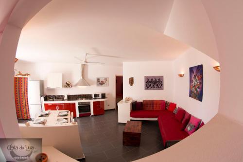 A kitchen or kitchenette at Cala da Lua apartments