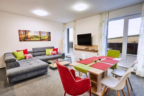 Posezení v ubytování Mountain Apartments Klínovec Hexagon