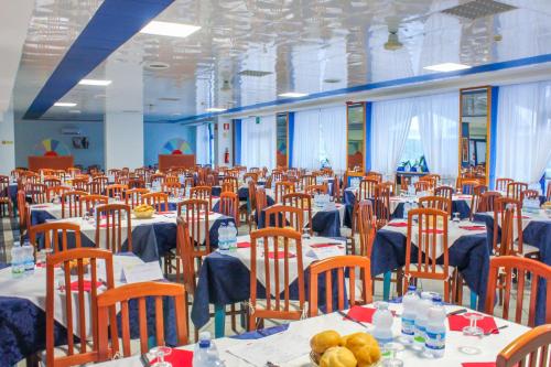 En restaurant eller et andet spisested på Bella Italia Sport Village