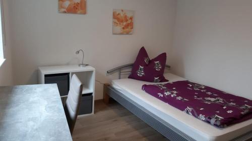 Ένα ή περισσότερα κρεβάτια σε δωμάτιο στο Monteurzimmer Klettgau