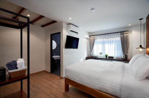 Postel nebo postele na pokoji v ubytování P2 Wood Loft
