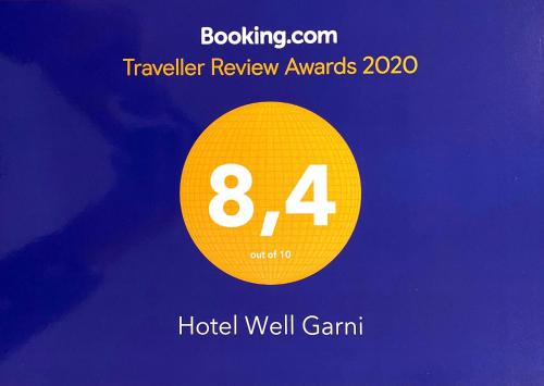 a yellow circle with the number on it at Hotel Well Garni in Wittlich