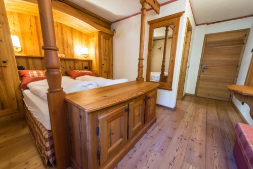 Postel nebo postele na pokoji v ubytování Rifugio Lago Nambino