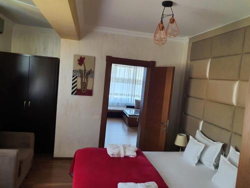 Giường trong phòng chung tại Vila Reyna