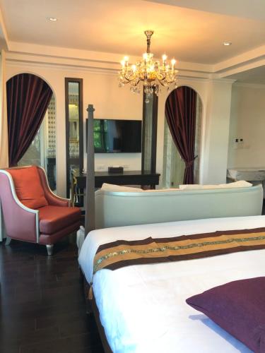 Letto o letti in una camera di Nanta Glam CM Hotel & Residences