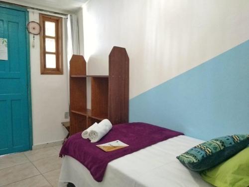 Cama ou camas em um quarto em Estação Caraíva