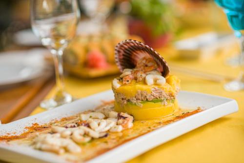 a piece of food on a plate on a table at Colina de Montalva in Tarapoto