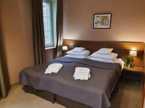 Hotel Siesta में एक कमरे में एक या कई बेड