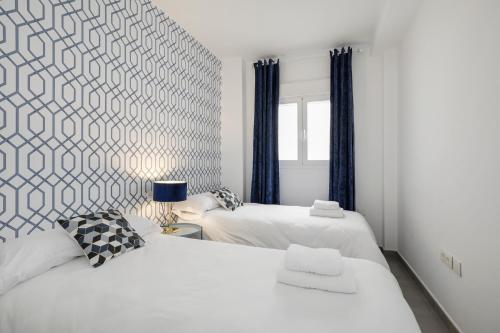 Cama o camas de una habitación en HI ROOM - Smart Apartments - HE 1