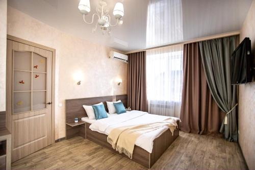 En eller flere senge i et værelse på Студия на Адмиральской