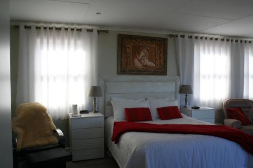 Ένα ή περισσότερα κρεβάτια σε δωμάτιο στο Ocean Dreams B&B