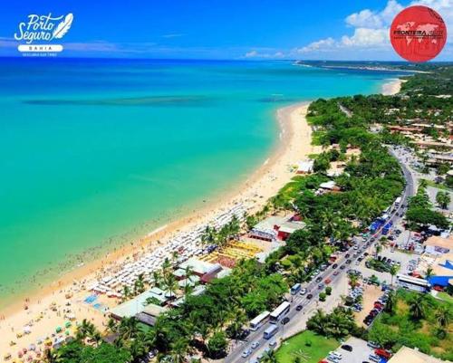 an aerial view of a beach and the ocean at FLAT RESID MONT CARMELO in Porto Seguro
