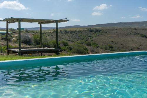 Bazén v ubytování Hartenbos Private Game Lodge nebo v jeho okolí