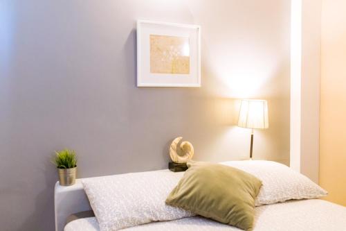 Cama o camas de una habitación en THE BEACH CHA AM Residence