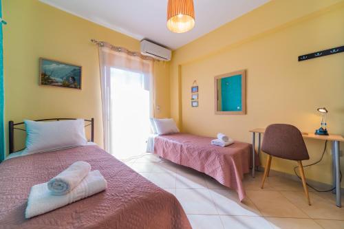 Ένα ή περισσότερα κρεβάτια σε δωμάτιο στο Deluxe Villa Kamba with Sea View