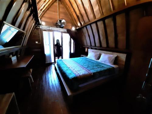 Кровать или кровати в номере Telagamas Guest House