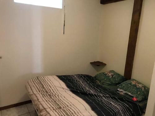 מיטה או מיטות בחדר ב-Appartement à Mitzach