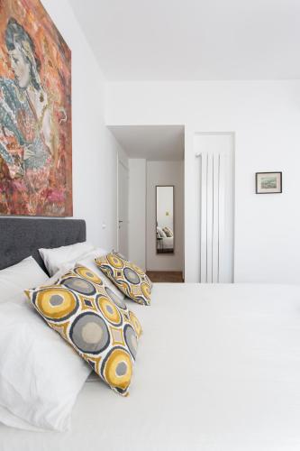 Una cama o camas en una habitación de Dimora Toledo