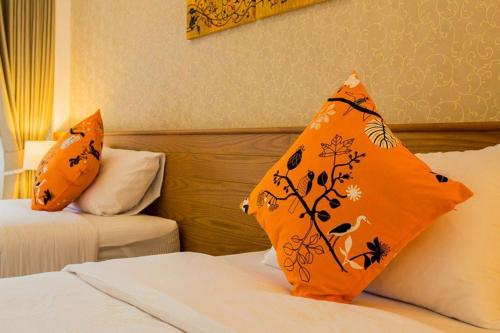 Letto o letti in una camera di Palmari Boutique Hotel