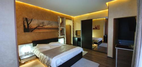 A bed or beds in a room at Villa Onix