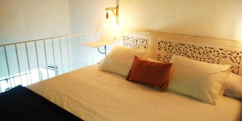 Postel nebo postele na pokoji v ubytování La Fuente 14, Casa Solariega en Pleno Centro