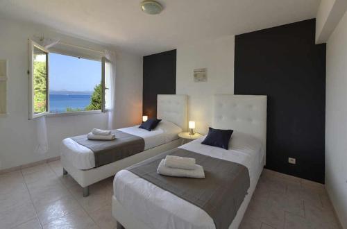 Ένα ή περισσότερα κρεβάτια σε δωμάτιο στο Residence Arinella