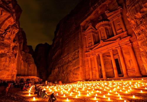 a large group of lights in front of a building at The Red Rose City in Wadi Musa