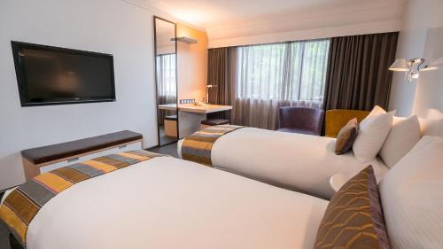 Postel nebo postele na pokoji v ubytování Scenic Hotel Marlborough
