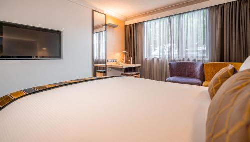 Postel nebo postele na pokoji v ubytování Scenic Hotel Marlborough