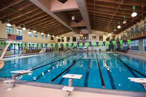 a large swimming pool in a large building at The Cozy Downtime Condo in Incline Village