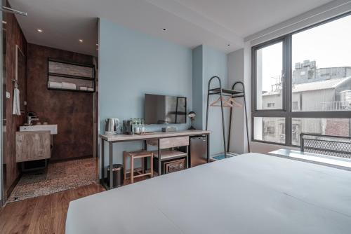 Ένα ή περισσότερα κρεβάτια σε δωμάτιο στο Somer Chew Hotel