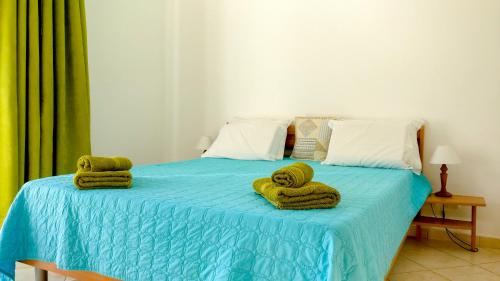 Кровать или кровати в номере Villas Nobre