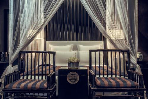 Tempat tidur dalam kamar di Paradise Road Tintagel Colombo