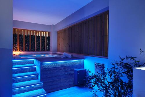 Katil atau katil-katil dalam bilik di Savvas Luxury Suites